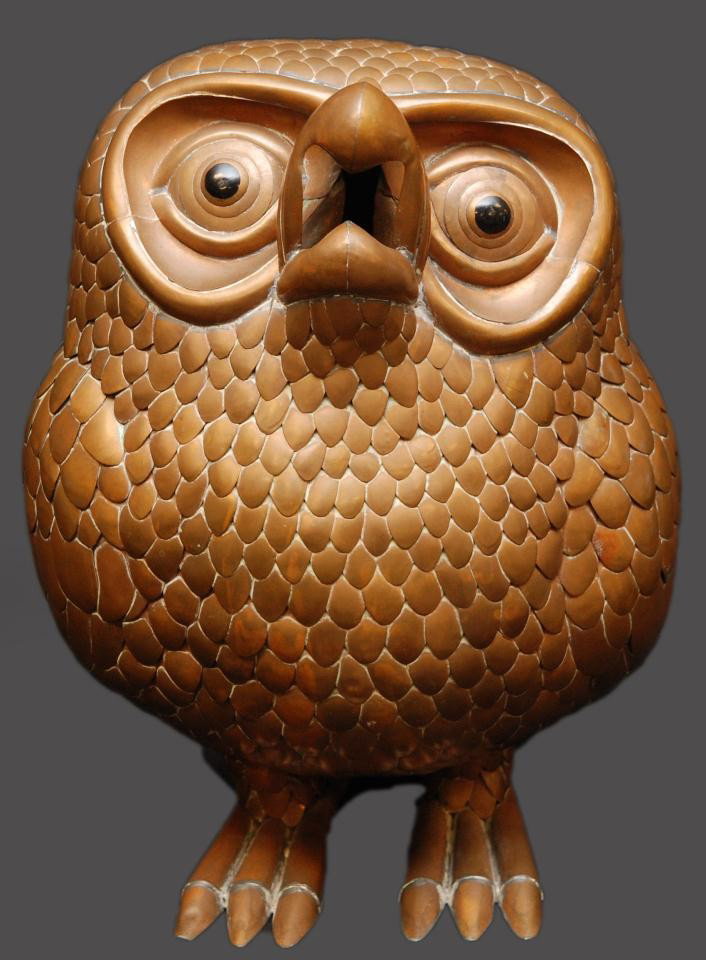 SERGIO BUSTAMANTE BRASS OWL SCULPTURE: Sergio Bustamante (AMERICAN/MEXICAN, 1942). Interesting brass owl figure. Signed to back and numbered 55/100. Measures 16" height x 12" width (40.6cm x 30.5cm).
