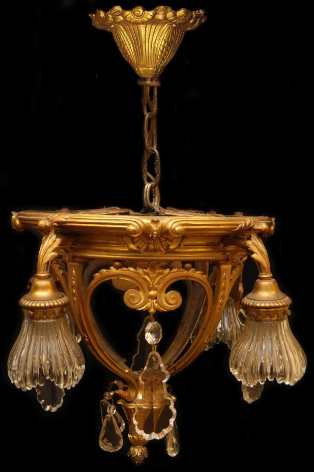 FRENCH BRONZE & CRYSTAL SHADE CHANDELIER: Dore bronze and crystal shade chandelier. Has scrolled design throughout with figural grape cluster finial. Measures 16" height x 18" diameter (40.6cm x 45.7cm). Measures 30" height including chain an