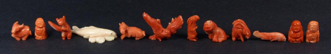 12pcs CHINESE CARVED CORAL MINIATURE FIGURINES: 12 hand carved Chinese coral figures. Includes 3 buddha figures, two fish, two rabbits, a lion, an ox, a donkey, a squirrel and an eagle. Largest measures 2 1/4" length (5.7cm). Total weight of coral 
