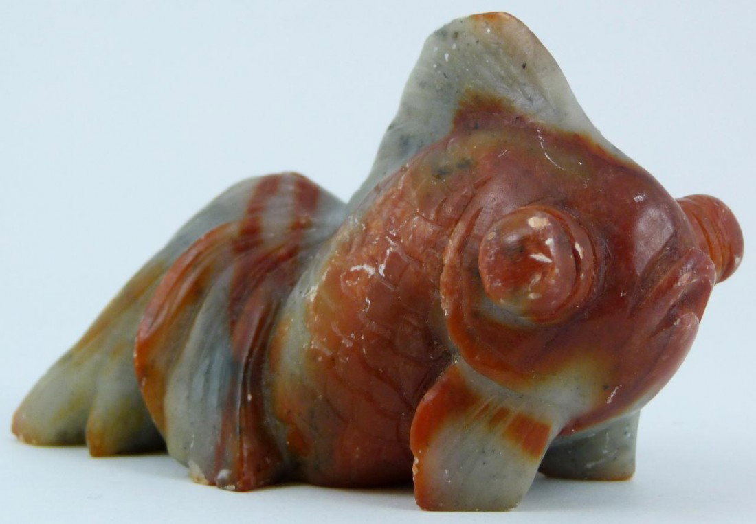 CHINESE HAND CARVED SOAPSTONE KOI: Chinese carved soapstone koi. 19th/20th century. Measures 2 1/8" height x 3 1/2" length (5.3cm x 8.8cm).