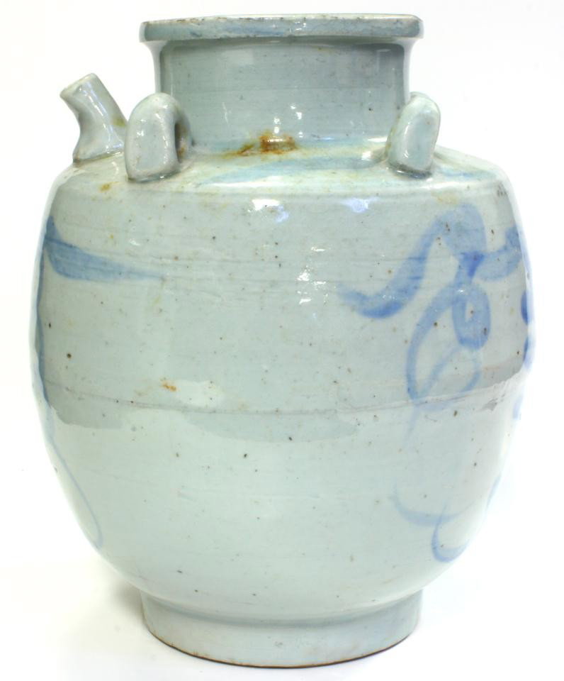19th CENTURY CHINESE PORCELAIN OIL JUG: Antique blue and white pottery oil jug. Has four round handles to top with spout. Has blue free form line design to body. Signed to side. 19th century. Measures 9 1/2" height (24.1cm).