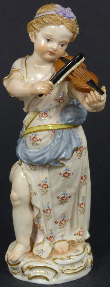 MEISSEN PORCELAIN FIGURE OF GIRL w/ VIOLIN: Antique Meissen German porcelain figurine. Hand painted porcelain figurine depicting a young female violinist draped in floral gown with one exposed leg. Stamped on bottom with blue crossed swords and