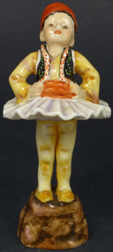 ROYAL WORCESTER FG DOUGHTY FIGURE GREECE: Royal Worcester World figure depicting boy with hands on hips. Represents the country of Greece. #3069. Measures 3 1/2" height (8.9cm). Guaranteed original. Condition: No apparent chips, cracks, crazi
