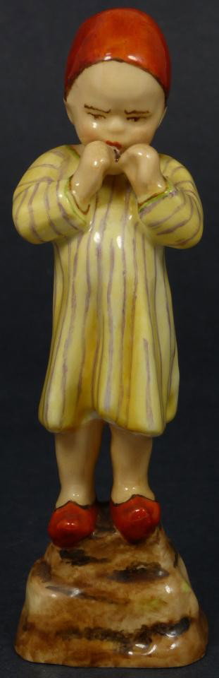 ROYAL WORCESTER FG DOUGHTY FIGURE EGYPT: Royal Worcester World figure depicting boy eating. Represents the country of Egypt. #3066. Measures 5 1/2" height (13.9cm). Guaranteed original.