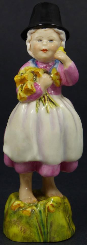 ROYAL WORCESTER FG DOUGHTY FIGURE WALES: Royal Worcester World figure depicting girl with flowers. Represents the country of Wales. #3103. Measures 5 1/4" height (13.3cm). Guaranteed original. Great. No apparent chips, cracks, crazing, break