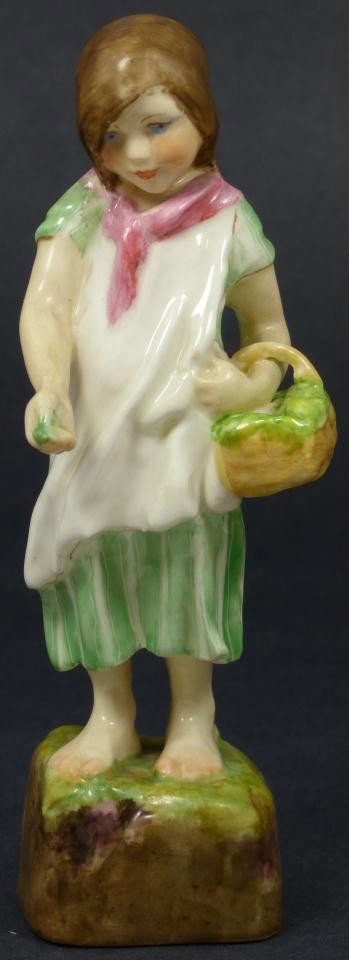 ROYAL WORCESTER FG DOUGHTY FIGURE IRELAND: Royal Worcester World figure depicting girl with basket. Represents the country of Ireland. #3178. Measures 5 3/4" height (14.6cm). Guaranteed original. Good. Has small chip to tip of vegetable in wom