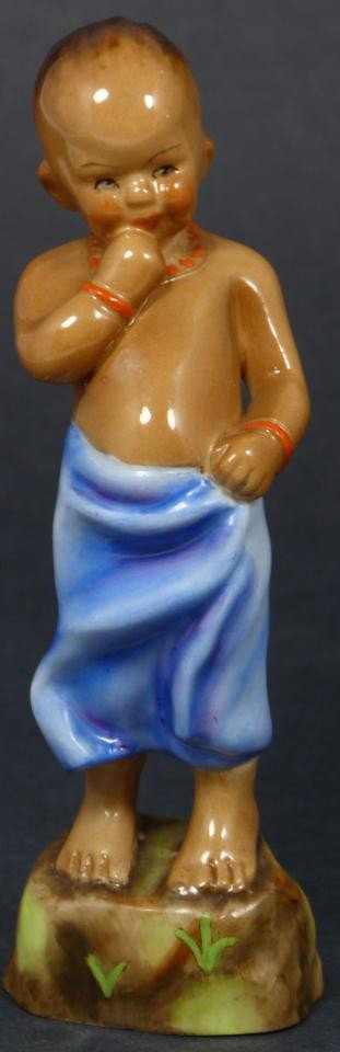 ROYAL WORCESTER FG DOUGHTY FIGURE BURMA: Royal Worcester World figure depicting boy. Represents the country of Burma. #3068. Measures 4 7/8" height (12.3cm). Guaranteed original. Condition: Great. No apparent chips, cracks, crazing, breaks o