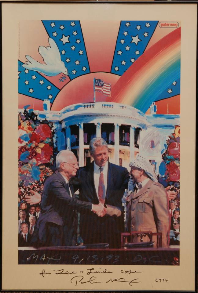 PETER MAX HAND SIGNED 'PEACE ACCORD' POSTER: Peter Max (AMERICAN/GERMAN, 1937) Poster print of the original 1993 acrylic on collage and mixed media depicting the Peace Accord. Hand signed to dedicated to bottom. Measures 21 1/2" height x 14 3/8"