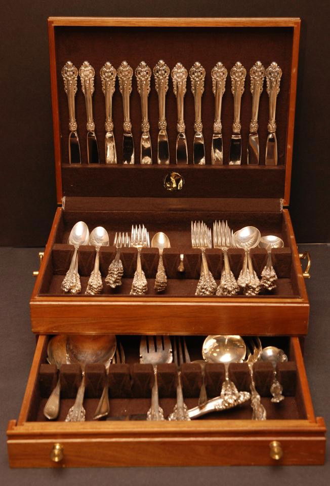 WALLACE GRANDE BAROQUE 81 PC DINNER SET: Grande Baroque sterling dinner set to serve 12 along with 4 serving pieces representing the unmatched composition and completely unique appearance of Wallace Silversmiths found in magnificent homes al