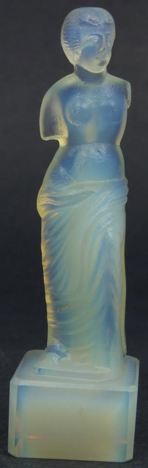 SABINO FRENCH GLASS STATUETTE OF VENUS DE MILO: Sabino French art glass iridescent statuette of Venus de Milo also known as Aphrodite de Milo. Measures 4 5/8" height (11.7cm).