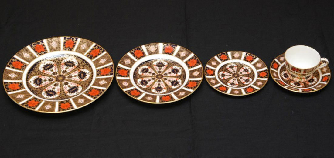 60 PIECE ROYAL CROWN DERBY OLD IMARI CHINA SET: Royal Crown Derby English porcelain set in the Old Imari pattern. Set includes the following pieces: 12 tea cups (2 5/8" height / 6.6cm), 12 Saucers (5 7/8" diameter / 14.9cm), 12 Bread & Butter Plate