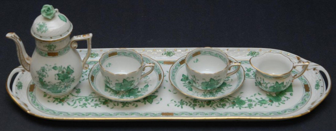 HEREND INDIAN BASKET 8 PIECE CHOCOLATE SET: 8 piece Herend Hungarian hand painted porcelain chocolate set in the Indian Basket Green pattern. Set includes a demi pitcher with 2 cups and saucers with creamer and oval serving tray. Pitcher measur