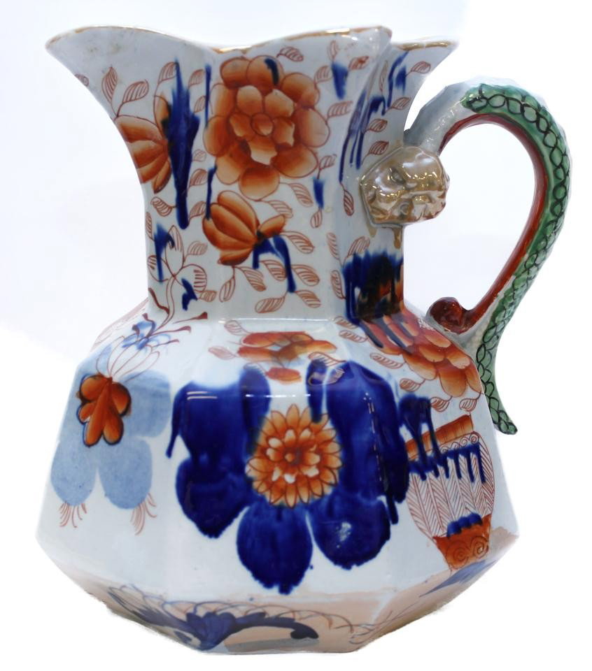 ANTIQUE MASONS IRONSTONE ENGLISH PORCELAIN PITCHER: Antique Mason's Ironstone Chinoiserie pitcher. Has a stunning hand painted design with figural foo dragon handle. Impressed mark MASON'S PATENT IRONSTONE CHINA to bottom. Circa 1820. Measures 9 5/8" h