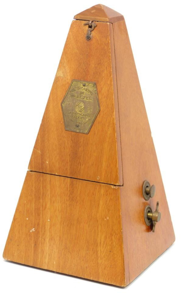 MAELZEL WOODEN CASED METRONOME BY SETH THOMAS: Old Maelzel wooden cased metronome made by Seth Thomas Clocks. Measures 9 1/2" heigth (24.1cm).