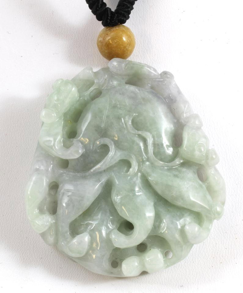 HAND CARVED JADEITE CITRON & BATS PENDANT: Hand carved jadeite figural citron jadeite & bats pendant. Has a magnificent relief carved design throughout. Beautiful mottling and translucence to this green and white jade pendant with hints of lav