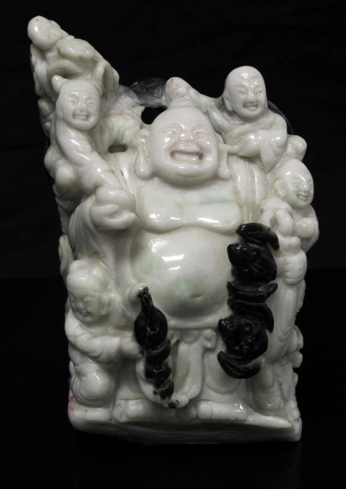 CHINESE HAND CARVED JADE BUDDHA GROUP FIGURE: Chinese hand carved Buddha group figure. Buddha is depicted with 5 young attendants. He is laughing and standing. Some attendants are holding coins. Bats are also seen in the scene. Beautiful white an