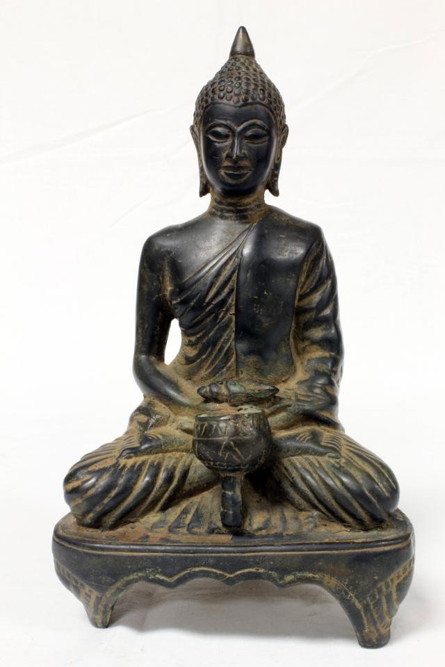 SANCAST TIBETAN BRONZE FIGURE OF SEATED BUDDHA: Antique Chinese Tibetan sand cast bronze figure of seated Buddha. In front of him is zubei cup and shell to hands. 19th century. Measures 9 1/2" height (24.1cm).
