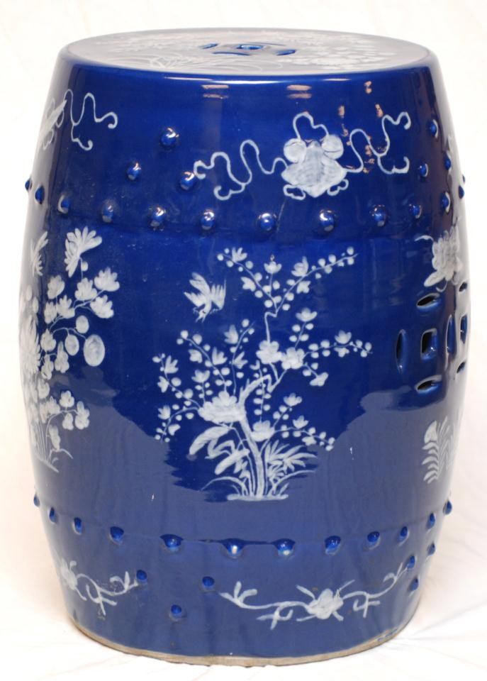 CHINESE BLUE & WHITE PORCELAIN GARDEN SEAT: Chinese hand painted porcelain blue and white garden seat with floral designs throughout. 19th century. Measures 19" height x 15" diameter (48.2cm x 38.1cm).