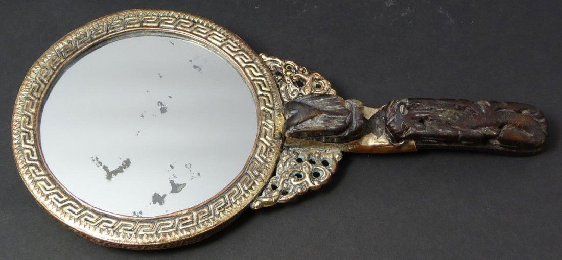 CHINESE SILVERED COPPER MIRROR w SOAPSTONE HANDLE: Silverplate copper & soapstone mirror. Has a fabulous repousse dragon design with Etruscan bordering to back of mirror. Has oval amber and jade stones set to reverse. Figural Jade Chih-Lung Dragon sce