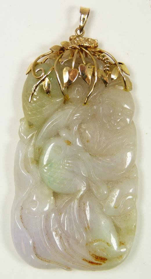 ANTIQUE CHINESE HAND CARVED PENDANT w 14K MOUNTIN: Chinese hand carved white jade pendant having a 14k yellow gold floral bale and mount. Finely carved with detailed etching and reticulation depicting a boy with fish. Beautiful translucent white, lave