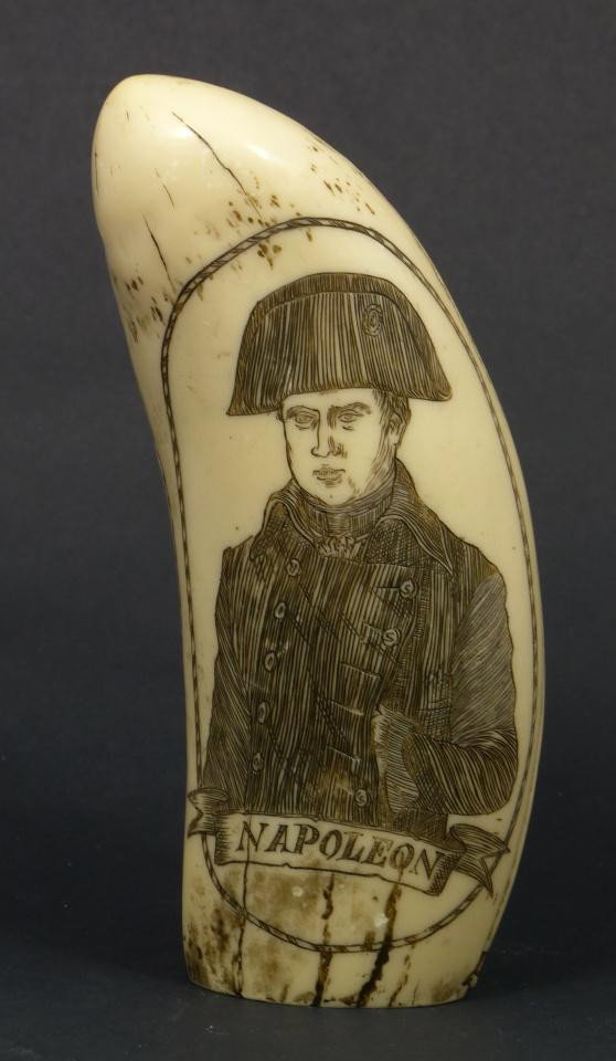 NAPOLEON SCRIMSHAW DATED 1815 DOUBLE CARVING: Well carved scrimshaw dated 1815 to side, signaling the end of the Napoleonic wars (1803 - 1815). "Napoleon" Bonaparte is depicted on one side and an intricately defined ship battle scene of three mat