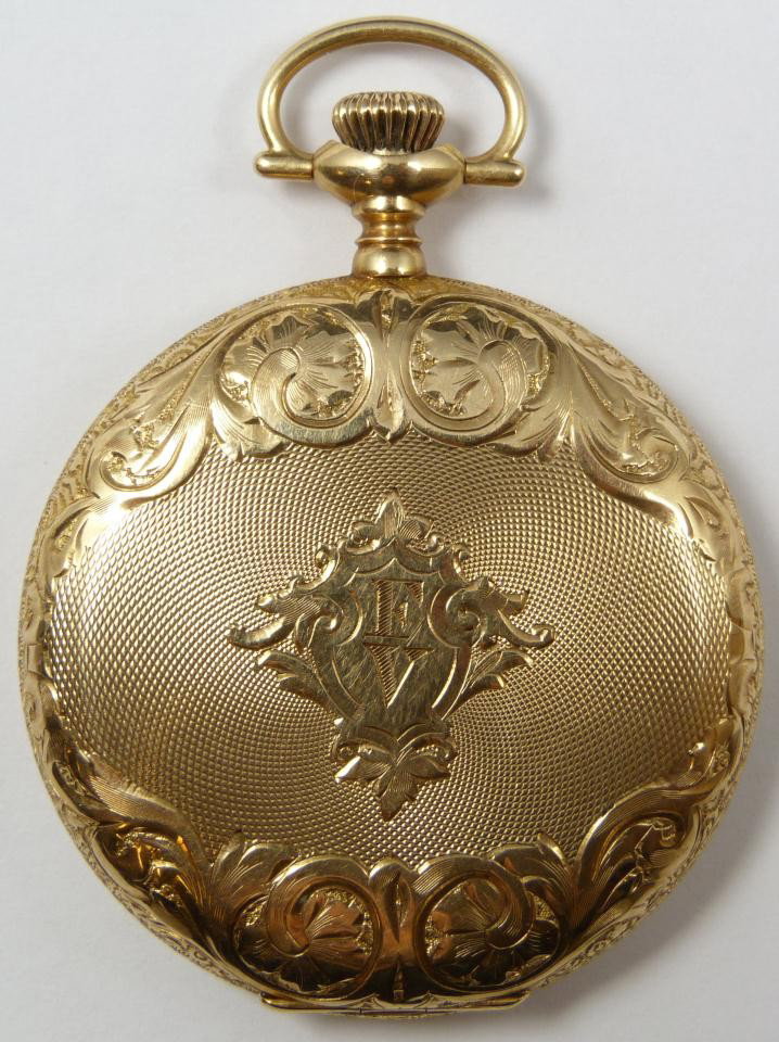 ELGIN 14kt GOLD HUNTERS CASE POCKET WATCH: Elgin solid 14 kt Hunter's case circa 1910 near mint size 12 pocket watch. Hand engraved art nouveau embellishments, initials FV in baroque letters in center of case. This is a beauty and in unused co