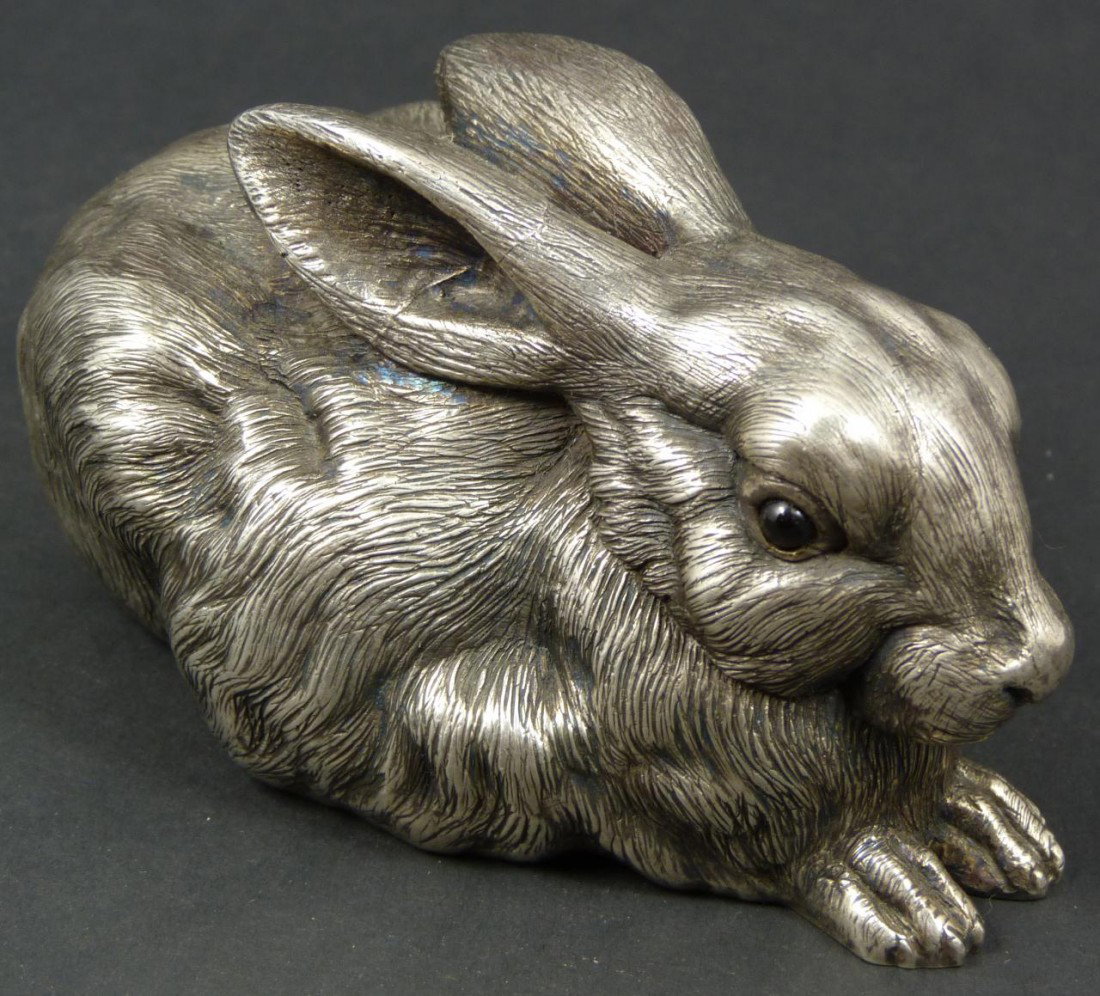 LARGE RUSSIAN SILVER RABBIT FIGURE: Russian silver rabbit figure. Cabochon cut garnet stones set to eyes. Has town marks and 84 silver purity marks to bottom. Also holds Julius Rappoport's "I.P." workmaster mark to bottom. Measures 2 3/