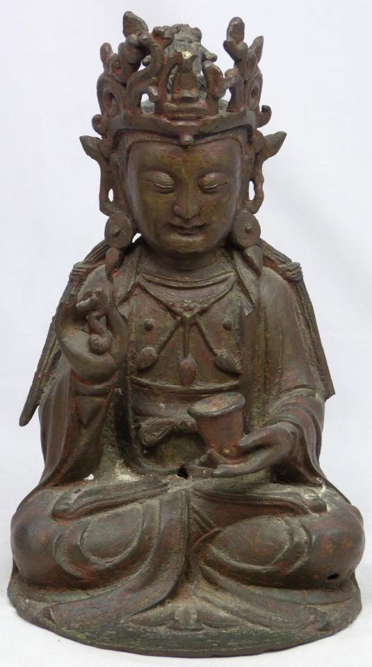BRONZE TEMPLE SCULPTURE OF ABHAYA MUDRA BUDDHA: Antique Chinese bronze figure of seated Abhaya Mudra Buddha. In his left hand in front of him is zubei cup and flower stalk to right hand. 18th/19th century. Measures 9 3/4" height x 6 1/2" width (24.