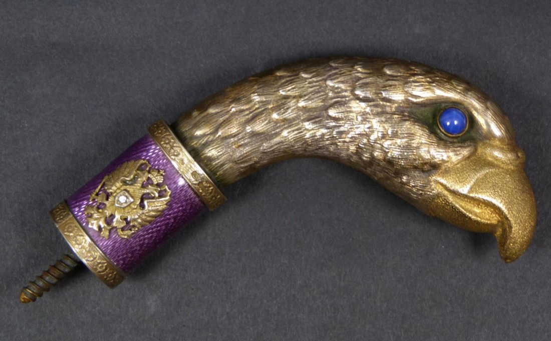 IMPERIAL RUSSIAN EAGLE SILVER & GUILLOCHE HANDLE: Imperial Russian figural Eagle head walking cane handle. Constructed of silver and completed with a gold wash. Neck has a stunning purple guilloche enamel cylinder with double headed eagle Russian coa