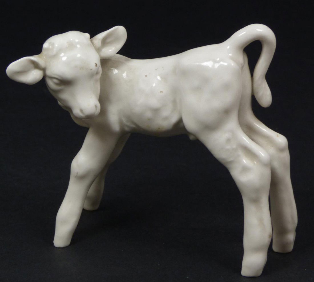 MEISSEN PORCELAIN BLANC DE CHINE CALF FIGURE: Meissen German porcelain Blanc-de-Chine porcelain calf figurine. Holds blue underglaze crossed swords mark to bottom with incised writing and numbers. Measures 3 1/4" height x 3 1/2" length (8.2cm x 8
