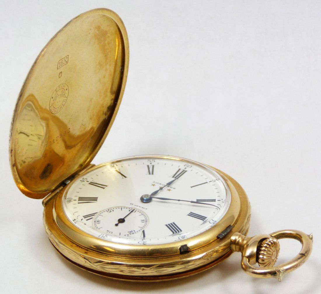 LONGINES 18K YELLOW GOLD GRANDS PRIX POCKET WATCH: Exquisite Longines Switzerland 18k yellow gold 6 Grands Prix watch (6 prize winner). Case has beautiful leaf and berry design throughout. White enamel face with black Roman numerals and notches with r