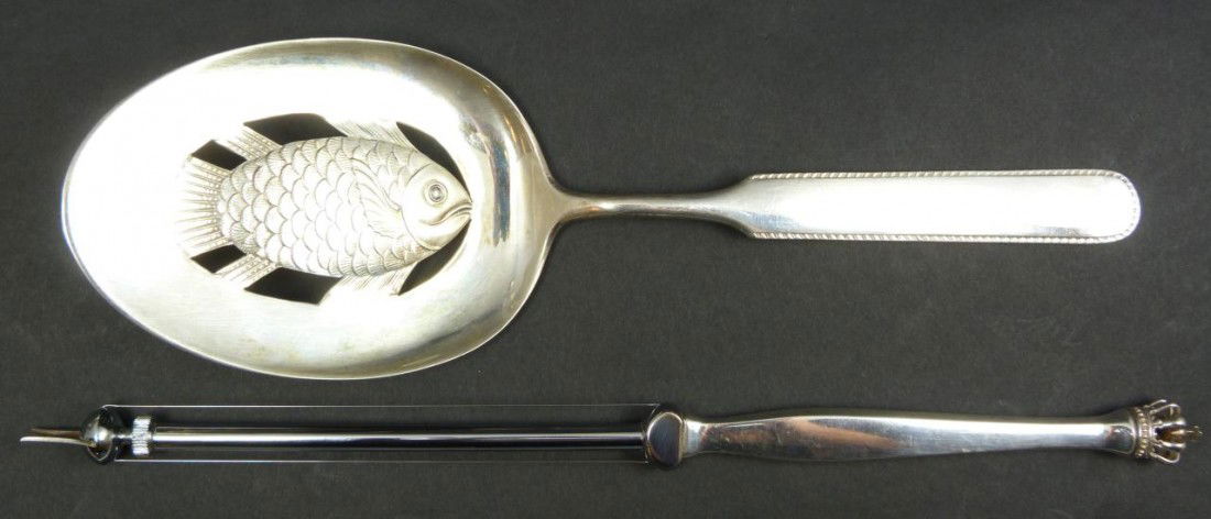 TWO DENMARK STERLING SILVER SERVING PIECES: Uniquely designed Danish, sterling silver cheese slicer, mounted with reticulated crown on handle, and hall marked DB, STERLING, DENMARK. In addition, this set includes a sterling silver, fish server,