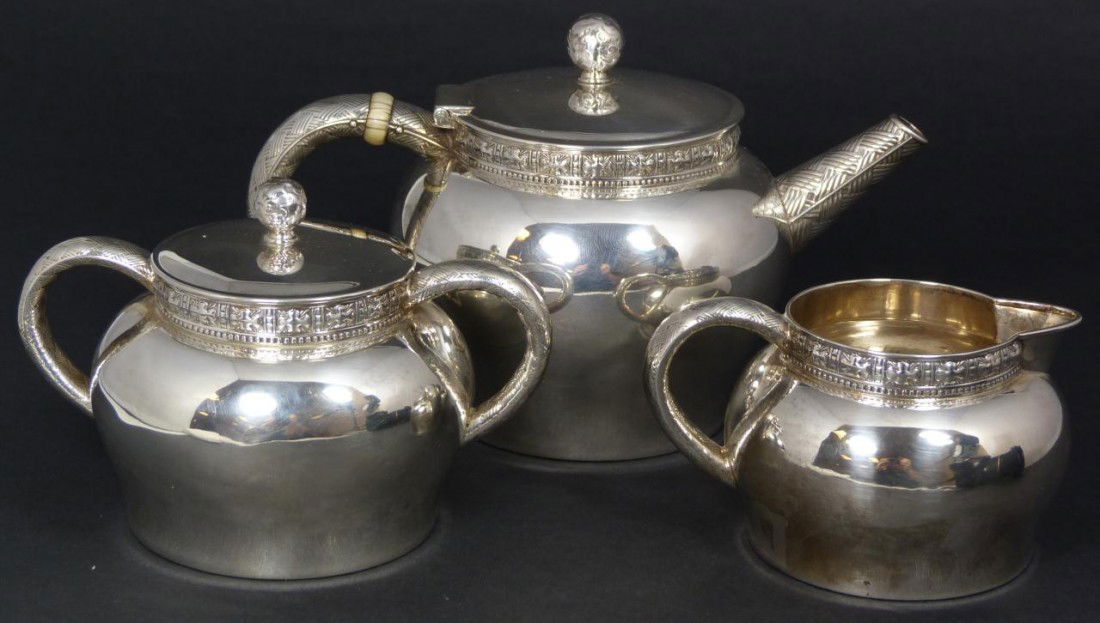 3 PC TIFFANY & CO STERLING SILVER TEA SET: Sterling silver, three pieces, tea set by Tiffany and Company while under the directorship of Edward Moore, between 1873 and 1891. The elegant basket weave pattern adorns the handles and spout, with c