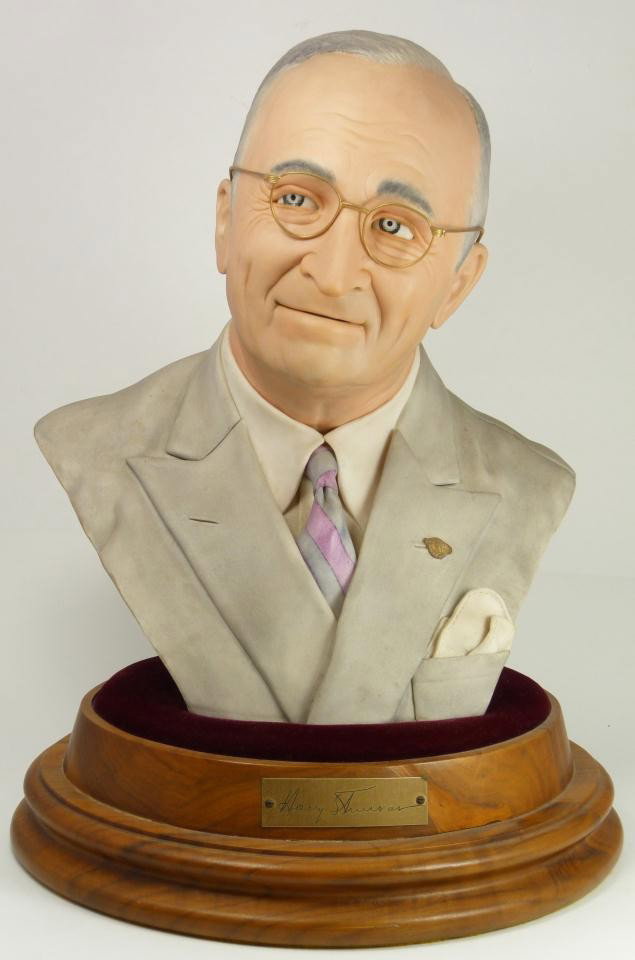 EDWARD ROHN PORCELAIN BUST OF HARRY TRUMAN: Edward J. Rohn porcelain bust depicting Harry Truman. Marked #15 and dated 1975. Set on wooden base with red velvet lining and name plaque to front. Measures 15 7/8" height x 11 1/2" width including b