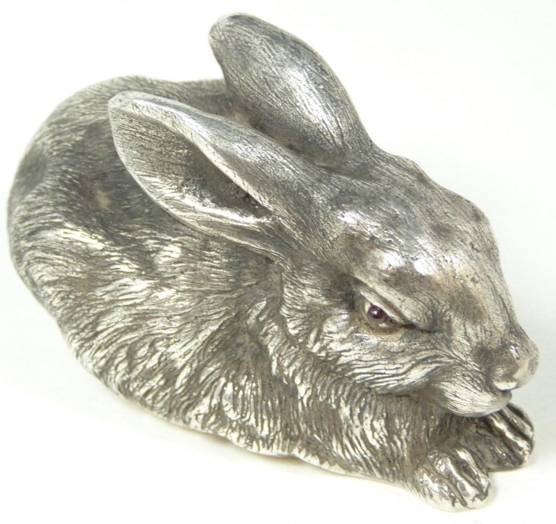 IMPERIAL RUSSIAN SILVER RABBIT FIGURE: Russian silver rabbit figure having cabochon cut citrine jewels set to eyes. Has town marks and 88 silver purity marks to bottom. Also hold Julius Rappaport workmaster marks to bottom. Measures 3 1/4"