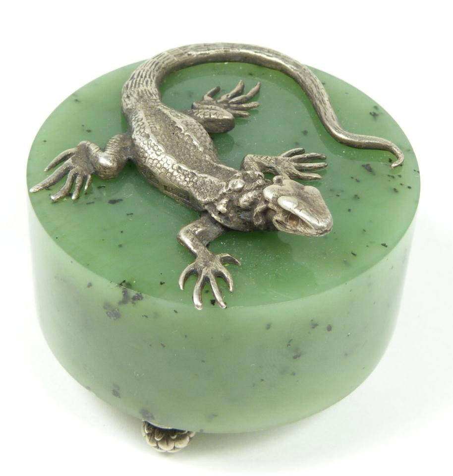 IMPERIAL RUSSIAN SILVER LIZARD FIGURE ON JADE BASE: Imperial Russian silver lizard set on spinach green nephrite jade square base. Base is suspended upon four acorn feet. Holds town marks and 84 silver purity marks. Measures 2" height x 2 1/4" depth (5