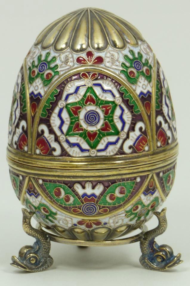 IMPERIAL RUSSIAN SILVER ENAMELED EGG RUCKERT: Finely crafted Imperial Russian silver egg with multicolor enameled design throughout. Has Cabochon citrine to bottom. Holds Imperial Warrant marks, town marks, silvery purity marks and Feodor Ruckert