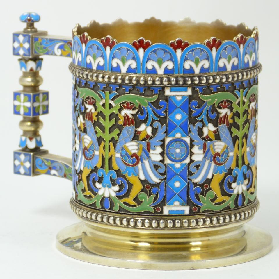 IMPERIAL RUSSIAN SILVER ENAMEL CUP KHLEBNIKOV: Imperial Russian silver enameled cup depicting standing eagles. Cup has gold wash interior. Has town marks and 84 silver purity marks to bottom. Also holds Ivan Petrovich Klebnikov workmaster mark to 