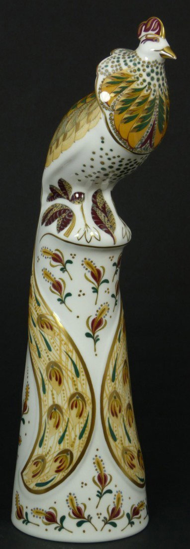 MINTON ENGLISH PORCELAIN BIRD FIGURE JALU: Minton English Porcelain figure depicting a bird on tall perch. Part of the 'Flights of Fantasy' series designed by John Ablitt. Titled 'Jalu'. Number MN 5. Dated 1993. Measures 12 3/4" height (32.3cm