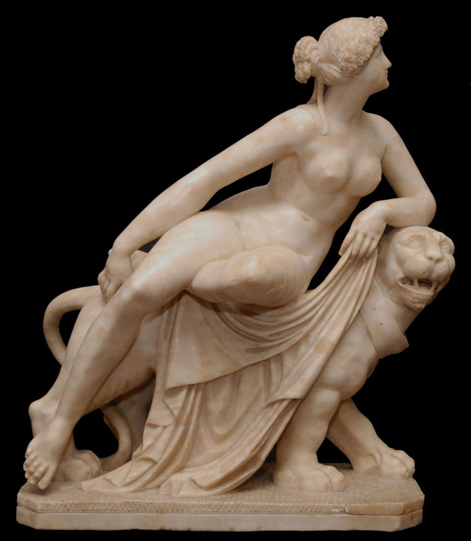 ITALIAN CARVED ALABASTER ARIADNE SCULPTURE: Large Italian carved alabaster sculpture depicting a nude female sitting on a panther with collar. After the work titled "Ariadne on the Panther" by Johann Heinrich von Dannecker (GERMANY/1758-1841).