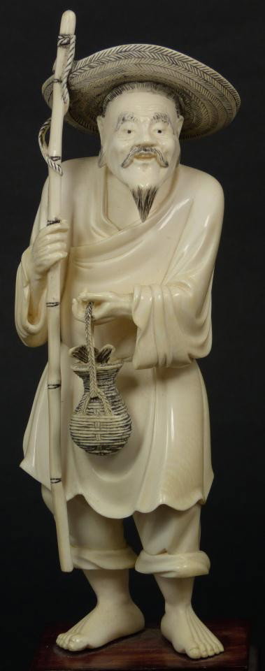 ANTIQUE CHINESE IVORY CARVED FISHERMAN FIGURE: Chinese hand carved ivory fisherman. He is depicted with bamboo pole and woven basket with fish in it. Mounted to wooden base. 19th/20th century. Measures 8 1/2" height + 1 1/2" base height. Total wei