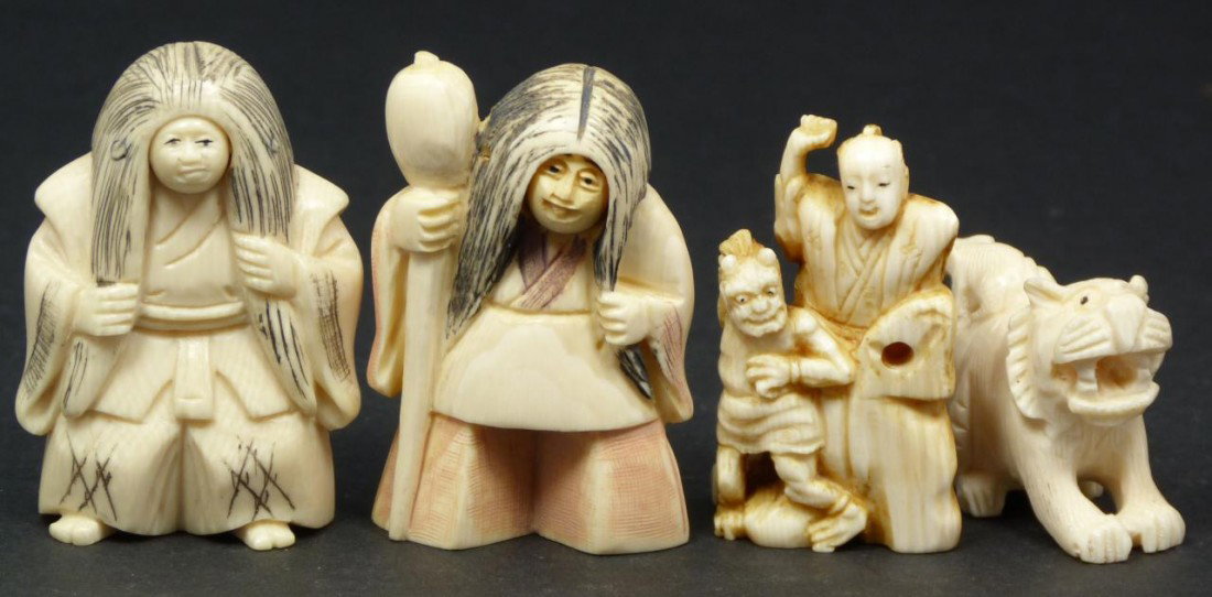 4 ANTIQUE JAPANESE IVORY NETSUKE FIGURES: 4 Japanese ivory netsuke figures. Lot includes two kabuki theater figures with changing faces, a Japanese warrior with Oni demon and tiger with mouse figure. Each pieced signed to bottom except for Ja