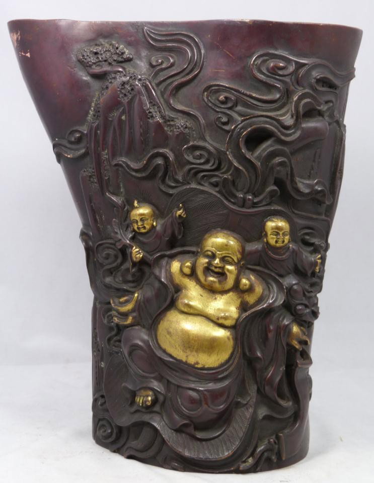CHINESE MING DYNASTY BRONZE 24K GILT BRUSH POT: Breathtaking Chinese Ming Dynasty Xuande bronze scholar's desk brush pot vase having Buddha mountain design with 24K gold gilding. Depicts a seated happy Buddha with two attendants to front, each havi