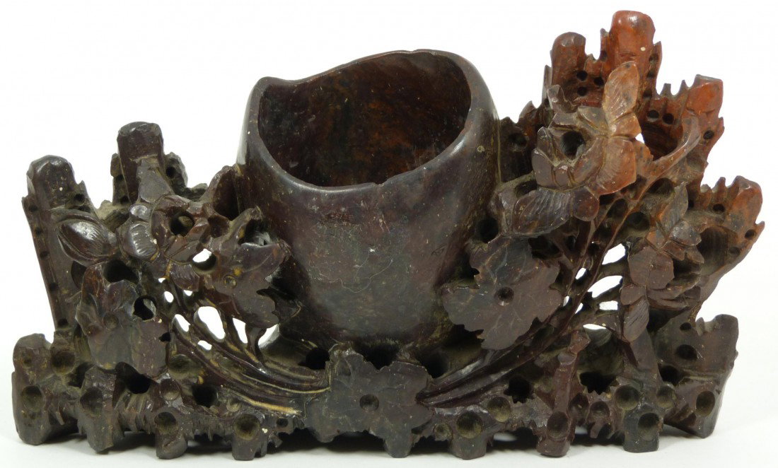 CHINESE RELIEF CARVED SOAPSTONE BRUSH POT: Chinese fully relief carved soapstone floral brush pot. 20th century. Measures 5 1/4" height x 8 1/2" length (13.3cm x 21.6cm). Total weight of 881 grams.