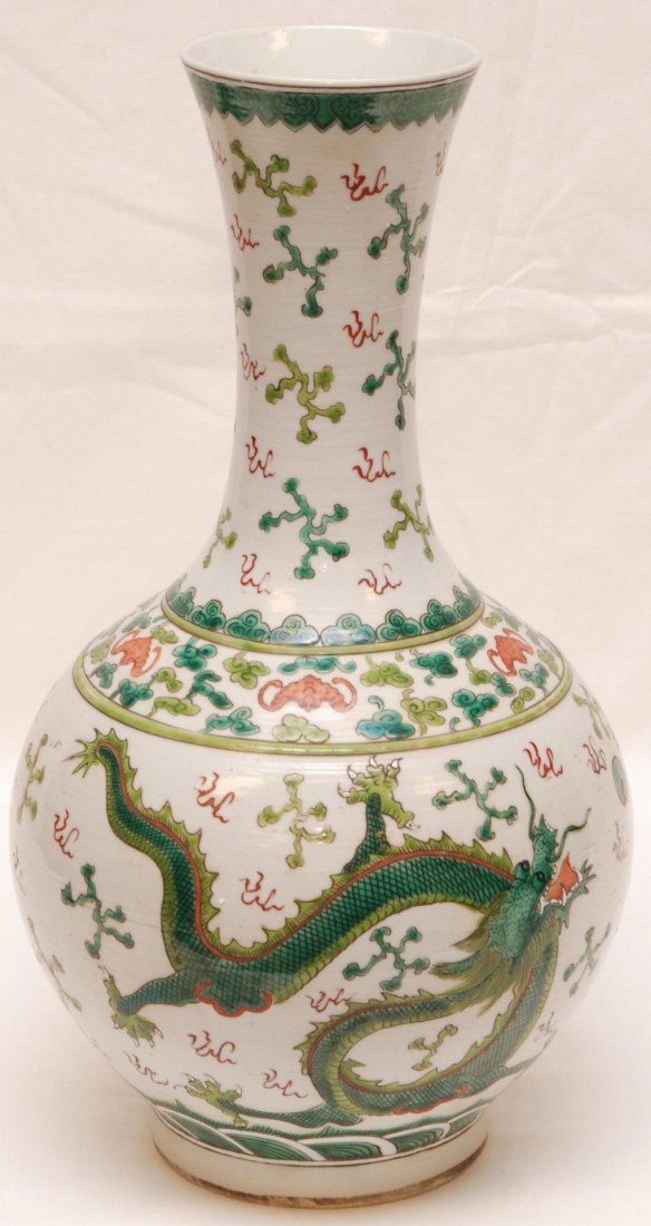 CHINESE XIANFENG PORCELAIN BULBOUS DRAGONS VASE: Antique Chinese Qing Dynasty Xianfeng period bulbous porcelain vase. Has a hand painted enameled design throughout depicting dragons having 5 talons with fire and clouds with bats. Water border design
