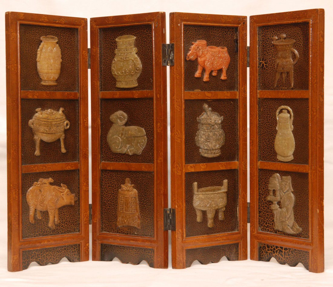 ANTIQUE CHINESE HUNG MU WOODEN JADE TABLE SCREEN: A Chinese table screen mad eof reticulated hung-mu rosewood and having a fitted jade carving within the center. The nephrite jade was originally a large panel from a jui sceptre. The incised carving o