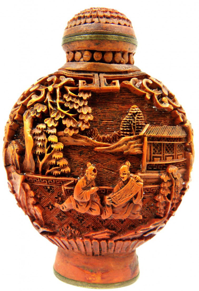 CHINESE QIANLONG CINNABAR SNUFF BOTTLE: Chinese lacquered cinnabar snuff bottle. Holds Qianlong (1736-1795) reign marks to bottom. Measures 2 3/4" height x 1 7/8" width (6.9cm x 4.7cm).