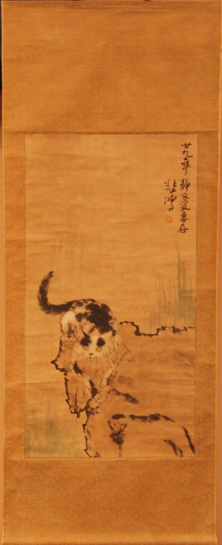 BEIHONG XU CHINESE WATER COLOR OF CAT: Watercolor on paper in scroll depicting a pouncing cat. Attributed Xu Beihong (CHINESE, 1895-1953) Measures 36" height x 19" width (91.1cm x 48.2cm).