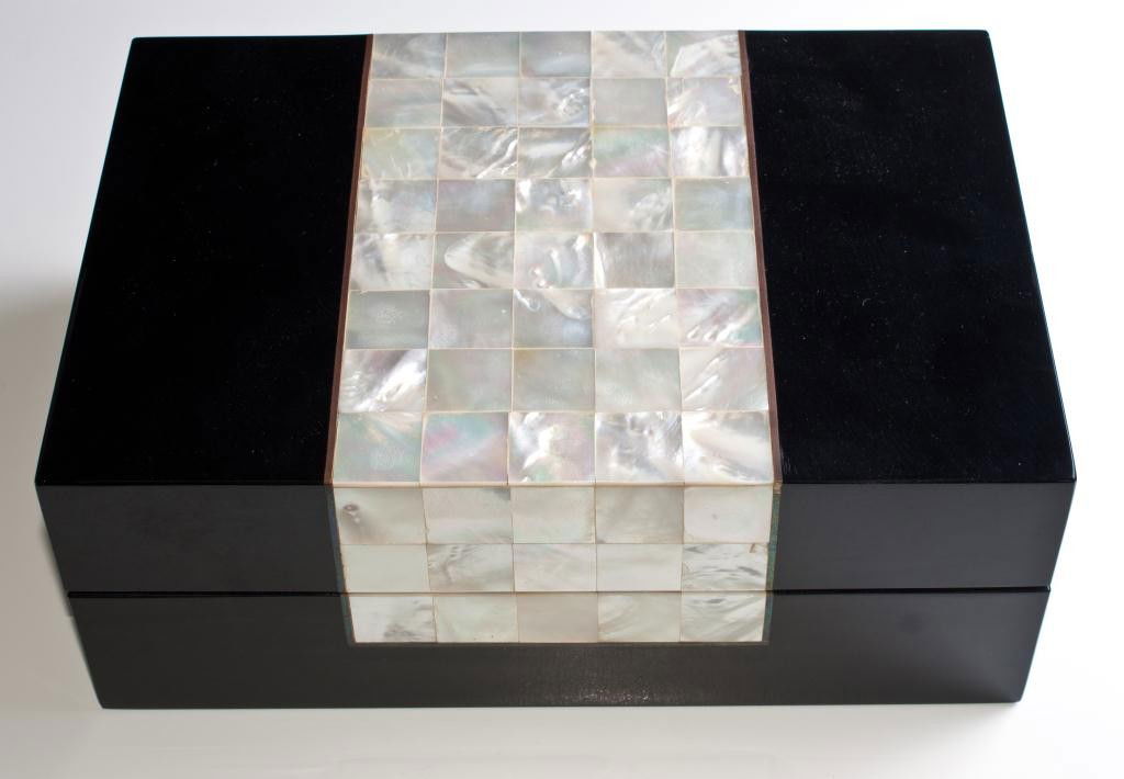 ITALIAN ABALONE INLAY HINGED BLACK LACQUER BOX: Has enchanting abalone design to outside with brass insert borders. Also has black lacquer finish to outside. Bare wood interior. Box and hinge in good condition. Early to mid 20th Century. Made in It