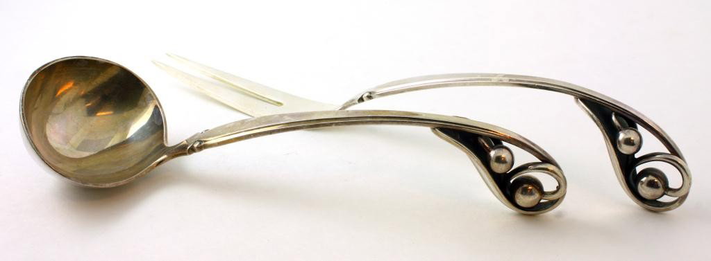 W&S SORENSEN DENMARK STERLING SERVING PIECES: W & S Sorensen Denmark sterling silver serving pieces. Similar to the Blossom pattern by Georg Jensen. Auction includes a two tine serving fork and gravy ladle. Total weight is 4.5ozt (140g) Fork meas